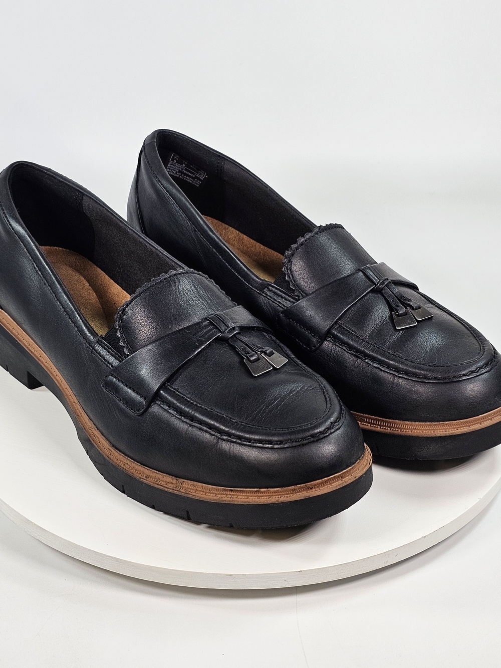 Clarks Westlynn Bella Black Leather Tassel Penny Loafers with Brown Welt